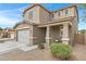 Two story house exterior with landscaping and front porch at 19538 N Crestview Ln, Maricopa, AZ 85138