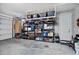 Organized garage with overhead storage and shelving at 19538 N Crestview Ln, Maricopa, AZ 85138