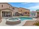 Relaxing backyard oasis with a sparkling pool and spa at 19538 N Crestview Ln, Maricopa, AZ 85138