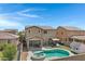 Backyard oasis with pool, spa, and patio at 19538 N Crestview Ln, Maricopa, AZ 85138