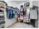 Large walk-in closet with ample shelving and hanging space at 19538 N Crestview Ln, Maricopa, AZ 85138