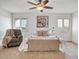 Main bedroom with ceiling fan and neutral decor at 19607 N Conquistador Dr, Sun City West, AZ 85375