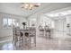 Bright dining area with a table and chairs, adjacent to the kitchen at 19607 N Conquistador Dr, Sun City West, AZ 85375