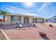 House exterior showcasing a well-maintained front yard and landscaping at 19607 N Conquistador Dr, Sun City West, AZ 85375