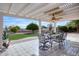 Outdoor patio area with seating and a pergola at 19607 N Conquistador Dr, Sun City West, AZ 85375