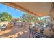 Spacious covered patio featuring a fountain and seating areas at 20055 N Siesta Rock Dr, Surprise, AZ 85374