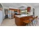 Modern kitchen with stainless steel appliances and granite island at 2011 E La Jolla Dr, Tempe, AZ 85282