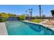 Refreshing blue swimming pool with grassy backyard at 2011 E La Jolla Dr, Tempe, AZ 85282