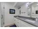 Bathroom with double vanity and a walk-in shower at 2039 E Aspen Dr, Tempe, AZ 85282