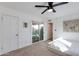 Bedroom with sliding door leading to patio at 2039 E Aspen Dr, Tempe, AZ 85282