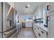 Modern kitchen with stainless steel appliances and white cabinetry at 2039 E Aspen Dr, Tempe, AZ 85282