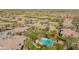 Aerial view of community with pool and golf course views at 21320 N 56Th St # 2043, Phoenix, AZ 85054