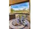 Relaxing balcony with golf course view, perfect for outdoor dining at 21320 N 56Th St # 2043, Phoenix, AZ 85054