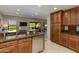 Modern kitchen with granite countertops and stainless steel appliances at 21320 N 56Th St # 2043, Phoenix, AZ 85054