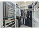 Large walk-in closet with ample shelving and hanging space at 21320 N 56Th St # 2043, Phoenix, AZ 85054