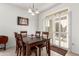 Dining area with a wooden table and chairs, near kitchen access at 22516 N Via De La Caballa --, Sun City West, AZ 85375