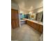 Double vanity bathroom with wood cabinets at 2322 S Rogers -- # 9, Mesa, AZ 85202