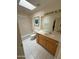 Bathroom with tub, toilet, and wood vanity at 2322 S Rogers -- # 9, Mesa, AZ 85202