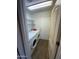 Functional laundry room with washer, dryer, and storage shelves at 2322 S Rogers -- # 9, Mesa, AZ 85202