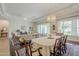 Bright dining area with hardwood floors and large windows at 24435 S 195Th St, Queen Creek, AZ 85142