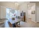 Bright dining room with large window and built-in hutch at 24435 S 195Th St, Queen Creek, AZ 85142