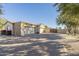 Garage with paver driveway and landscaping at 24435 S 195Th St, Queen Creek, AZ 85142