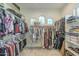 Large walk-in closet with plenty of storage at 24435 S 195Th St, Queen Creek, AZ 85142