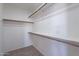 Spacious closet with double hanging rods and shelving at 2513 N 90Th Ln, Phoenix, AZ 85037