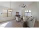 Bright living room with vaulted ceiling and hardwood floors at 2513 N 90Th Ln, Phoenix, AZ 85037