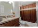 Bathroom with granite vanity and shower/tub combo at 2738 N 40Th Dr, Phoenix, AZ 85009