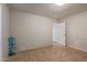 Small bedroom with tile floor and adjacent bathroom at 2738 N 40Th Dr, Phoenix, AZ 85009