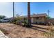 Front yard view of house with palm trees and landscaping at 2738 N 40Th Dr, Phoenix, AZ 85009