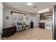 View of kitchen area with white appliances and tile flooring at 2738 N 40Th Dr, Phoenix, AZ 85009