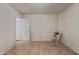 Small spare bedroom with tile flooring and a white door at 2738 N 40Th Dr, Phoenix, AZ 85009