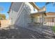 Side yard with covered patio and gravel landscaping at 277 E Windsor Ct, Gilbert, AZ 85296