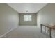 Bright bedroom with neutral walls and carpeted floor at 277 E Windsor Ct, Gilbert, AZ 85296