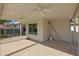 Covered patio with ceiling fan and backyard view at 277 E Windsor Ct, Gilbert, AZ 85296