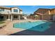 Octagonal pool in a sunny backyard setting with patio at 277 E Windsor Ct, Gilbert, AZ 85296