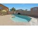 Octagon shaped pool with surrounding patio and seating area at 277 E Windsor Ct, Gilbert, AZ 85296