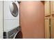 Stackable washer and dryer in a dedicated laundry room at 2950 W Louise Dr # 203, Phoenix, AZ 85027