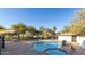 Refreshing community pool with brick patio and lounge chairs at 2950 W Louise Dr # 203, Phoenix, AZ 85027