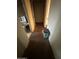 Long hallway with bathroom and door access at 3143 W Garfield St, Phoenix, AZ 85009