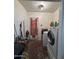 Laundry room with washer, dryer, and exterior access at 3143 W Garfield St, Phoenix, AZ 85009