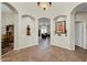 Elegant entryway with tile floors and arched doorways at 3199 N 159Th Dr, Goodyear, AZ 85395