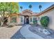 Front entry with walkway and mature trees at 3199 N 159Th Dr, Goodyear, AZ 85395