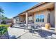 Inviting patio with seating area, perfect for outdoor dining at 3199 N 159Th Dr, Goodyear, AZ 85395