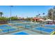 Well-maintained pickleball courts with seating area at 3199 N 159Th Dr, Goodyear, AZ 85395