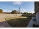 Simple backyard with grass and block wall at 3440 W Krall St, Phoenix, AZ 85017