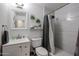 Clean bathroom with shower and white vanity at 3440 W Krall St, Phoenix, AZ 85017