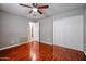 Bedroom with wood floors and a double door closet at 3440 W Krall St, Phoenix, AZ 85017